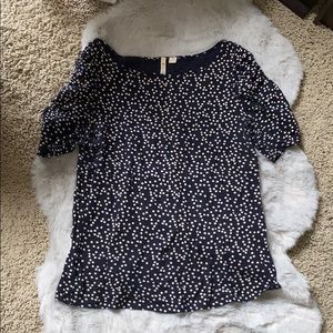 Really cute navy and white polka dot anthro top